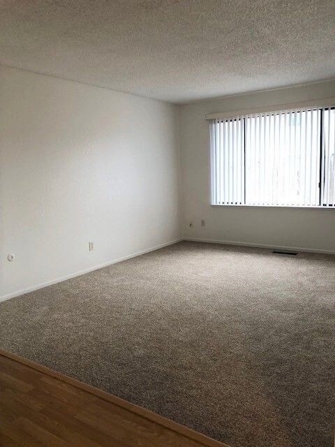 Building Photo - Must See 500 Move in Special