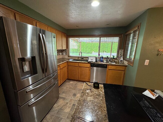 Building Photo - 5753 NW Landing Drive ~ Delightful Home wi...