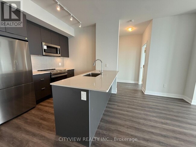 Photo du bâtiment - 430-4430 Square One Dr