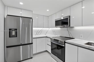 Building Photo - 3675 N Country Club Dr