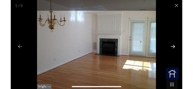 Living & dining room with gas fireplace - 303 Prettyman Dr
