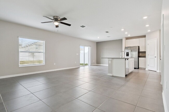 Foto del edificio - Spacious 4-Bed Retreat with 2.5 Baths in Davenport, FL – Your Next Rental Home Awaits!
