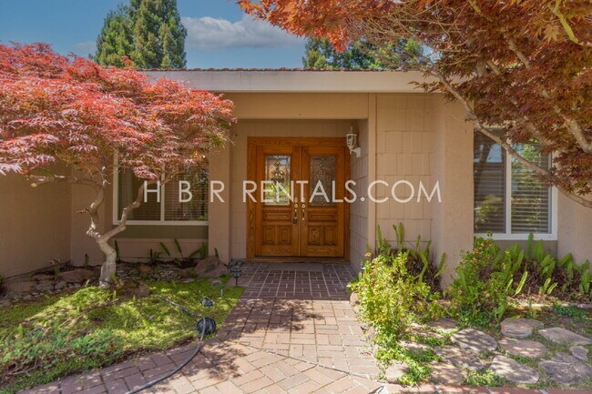 Building Photo - Charming 4-Bed with 3 Baths & Cozy Firepla...