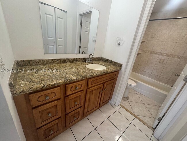 Building Photo - 7410 Woodmont Terrace
