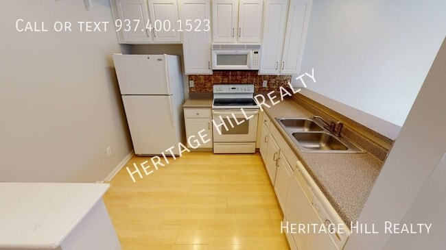 Building Photo - 2 Bedroom, 2.5 Bath Condo with 1 Car Garag...