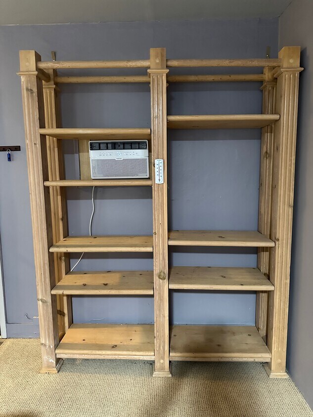 Two bookcases and AC - 5027 Fulton Ave