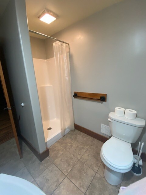 Main level bath. Upstairs bathroom has a tub. (No pic) - 246 Gold Ave NW