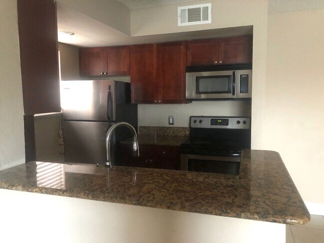 Foto del edificio - APARTMENT FOR RENT IN THE BEST AREA OF ORLANDO