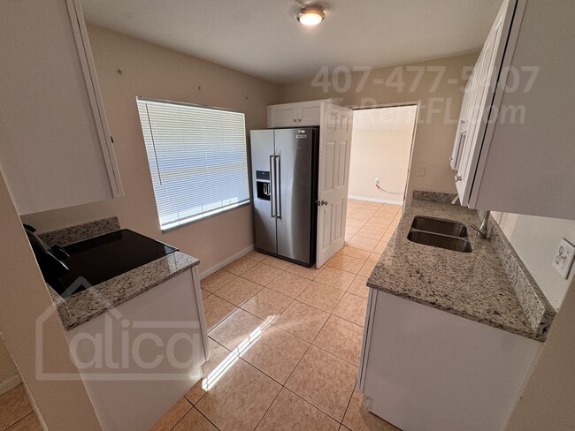 Building Photo - Lovely 3/2 in Orlando, FL - Move-In Specia...