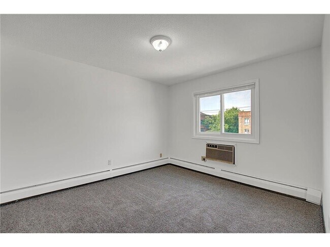 Building Photo - 2616 Harriet Avenue, Unit 321