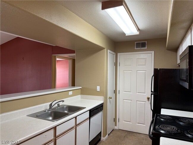 Building Photo - 2300 E Silverado Ranch Blvd