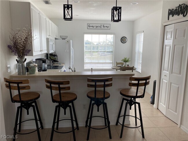 Building Photo - 5218 Chiquita Blvd S