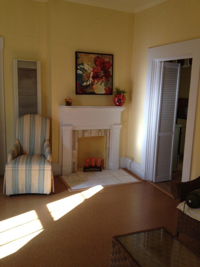 Living room with historic fireplace (non functional) - 519 Tusculum Ave