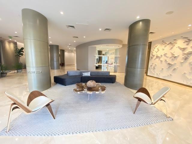Building Photo - 10275 Collins Ave