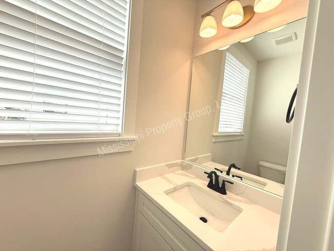 Building Photo - 4BD/4.5BA IN THE RESERVE PHASE II