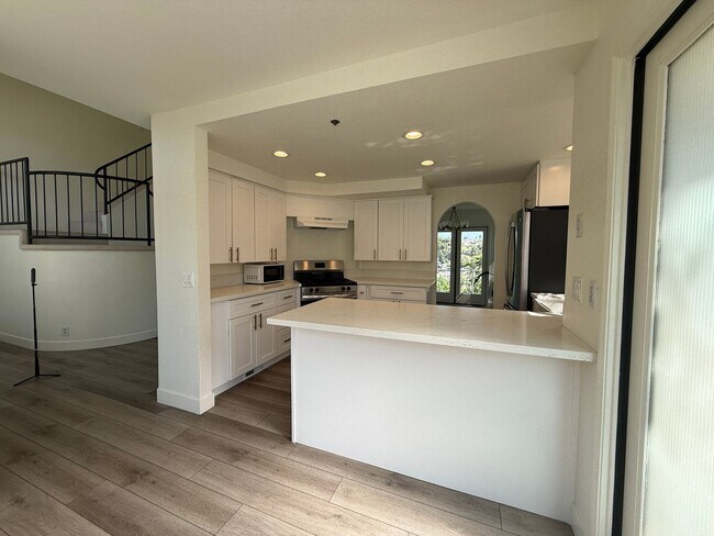 Building Photo - Recently Remodeled Spring Valley Home, 2 Car Garage, Vaulted Ceilings, Multiple Balconies