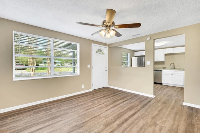 Building Photo - 6969 Delisle Dr