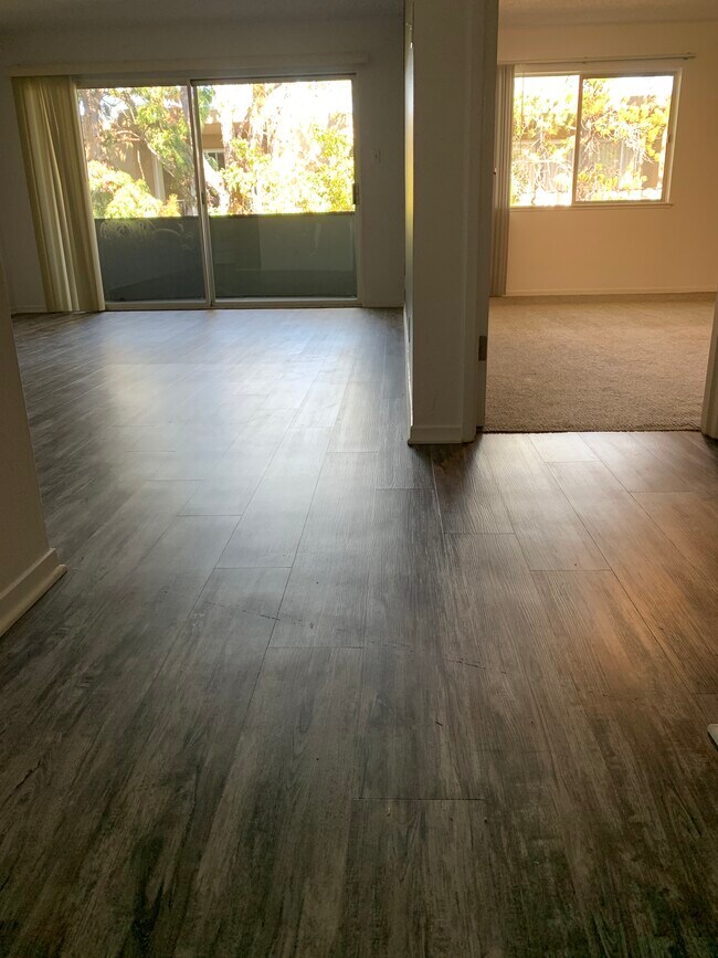 Updated Floors with Vinyl Plank in Living Areas and New Carpet in Bedroom - 1944 Garden Dr