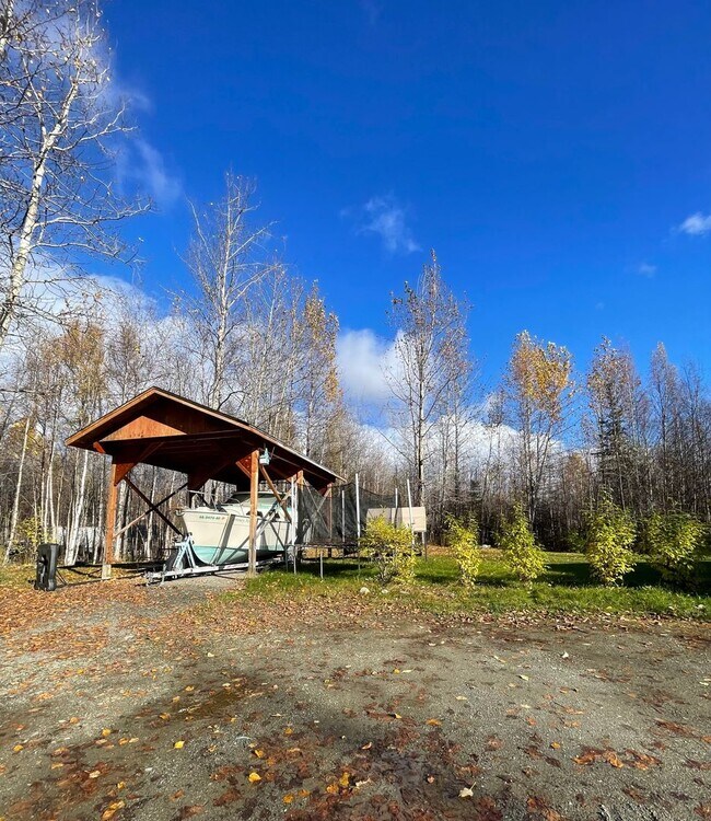 Building Photo - Ranch style 3bedroom/2 bathroom with an Oversized two car garage +giant carport!  Large private l...
