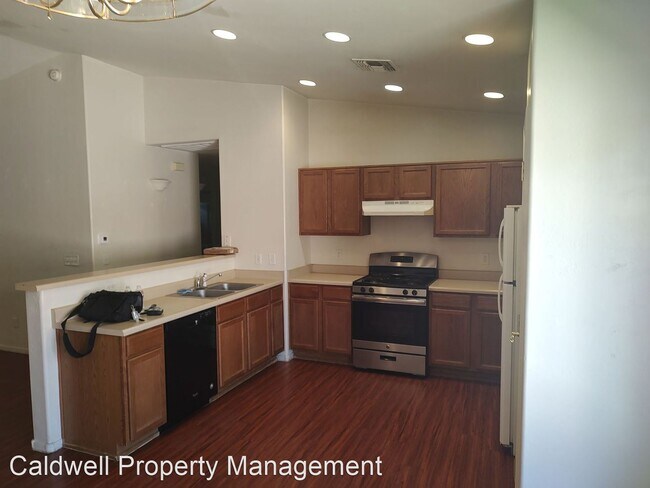 Building Photo - 4 br, 2 bath House - 5241 S. Via Noche Buena