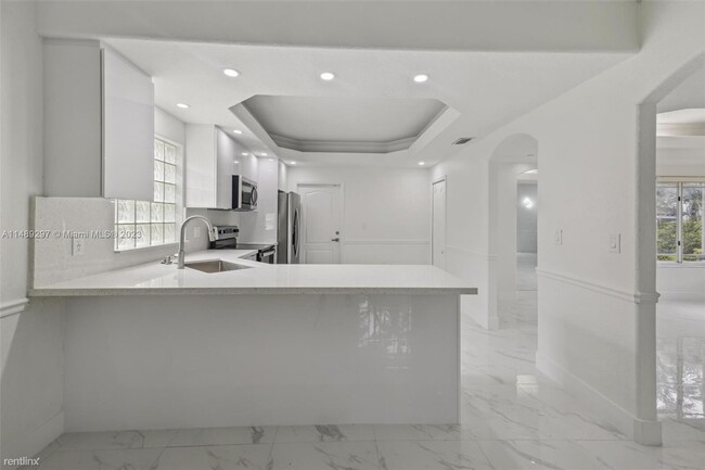 Foto del edificio - 4 br, 2.5 bath House - 8737 NW 140th Ln
