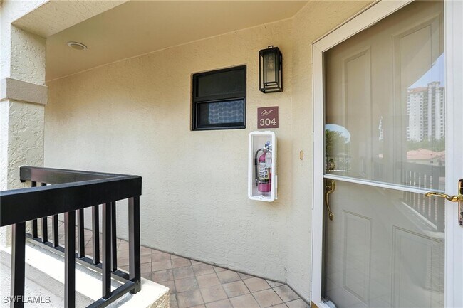 Building Photo - 7032 Pelican Bay Blvd