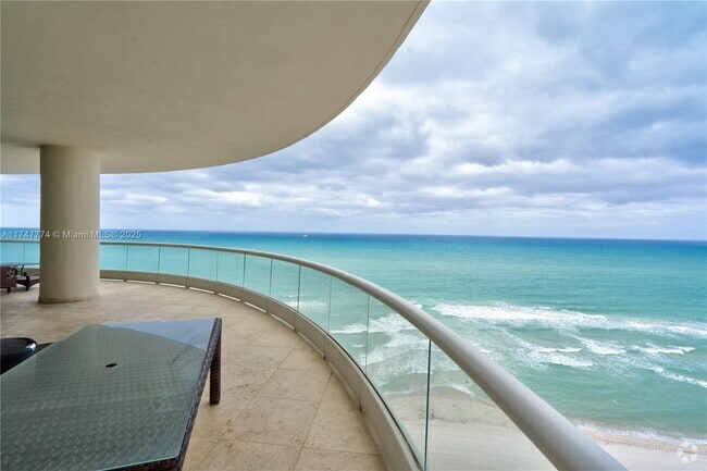 Building Photo - 16047 Collins Ave