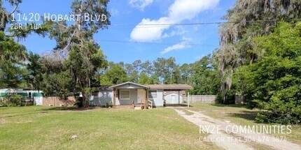 Building Photo - 11420 Hobart Blvd