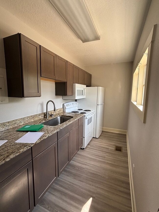 Building Photo - For Rent: Charming Mixed-Use Home – 1 Bedroom + Den