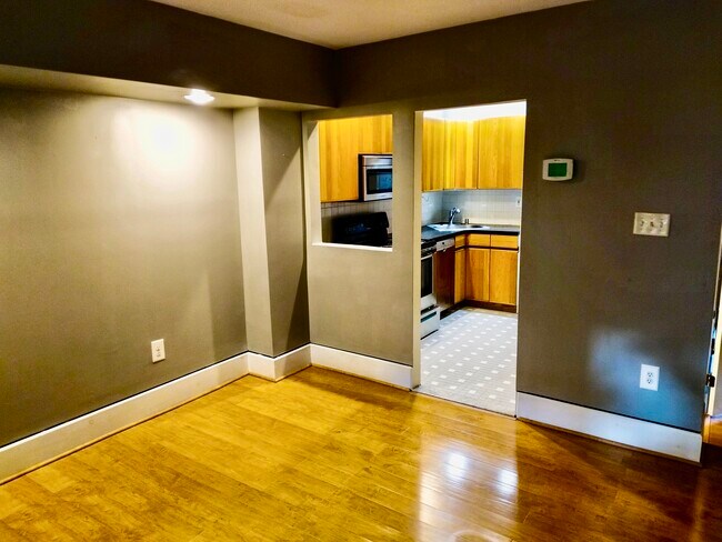 Living room and kitchen - 520 St Paul St