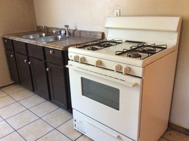 Foto del edificio - 12127 S Lowe Ave