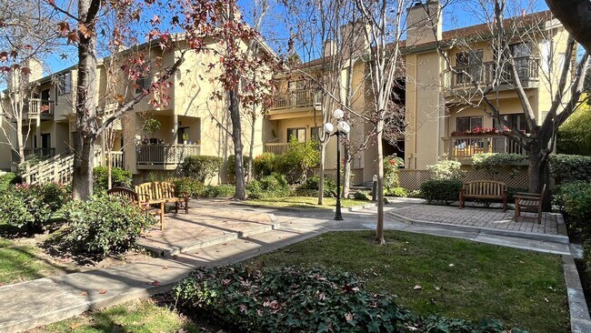 Building Photo - 2BD/2.5BA - Charming Townhome with Luxurio...