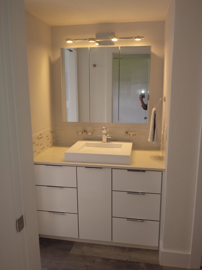 Plenty of storage space in Vanity & Mirrored Glass medicine cabinet. - 7505 SW 82nd St