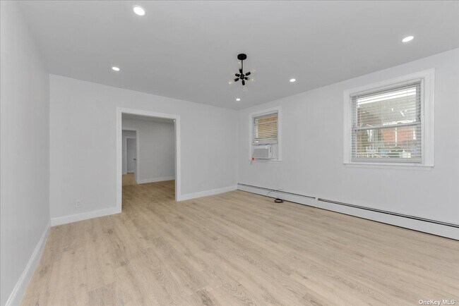 Building Photo - 129-14 135th Ave
