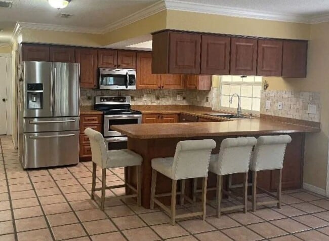 Building Photo - Welcome to this private retreat offering the perfect blend of luxury space and outdoor living.