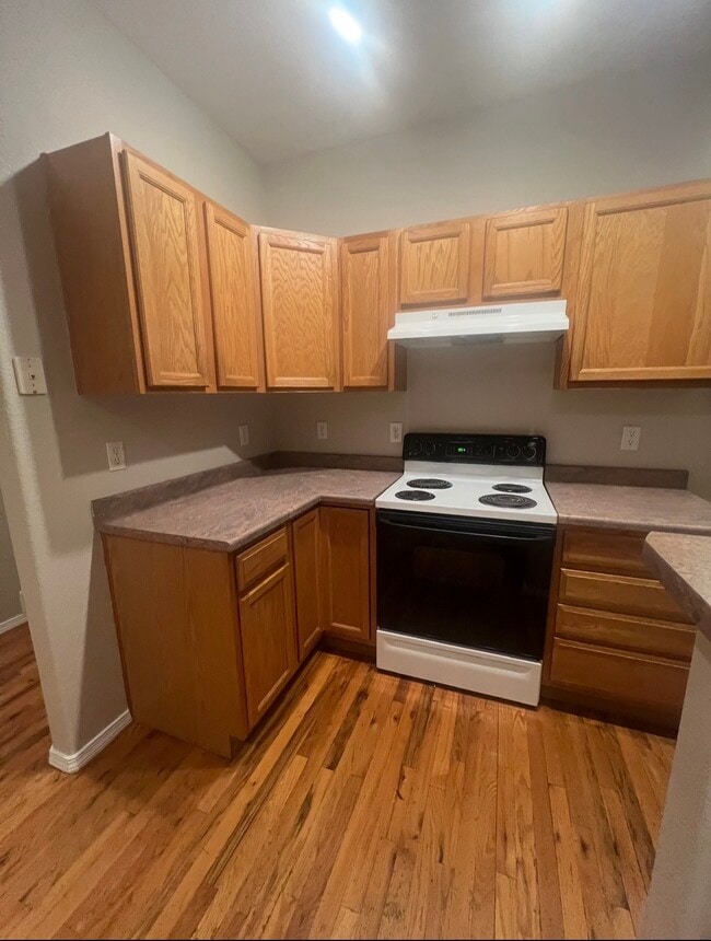 Kitchen with hardwood flooring, actual photo - 2563 Malpaso Pt