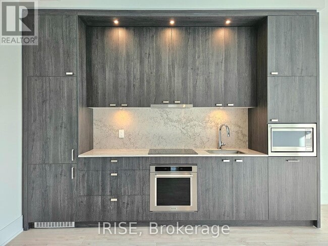 Photo du bâtiment - 115 Denison Ave