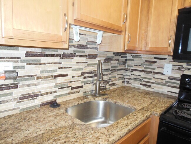 Building Photo - TWO BEDROOM TWO BATHROOM! WATERFRONT COMMU...