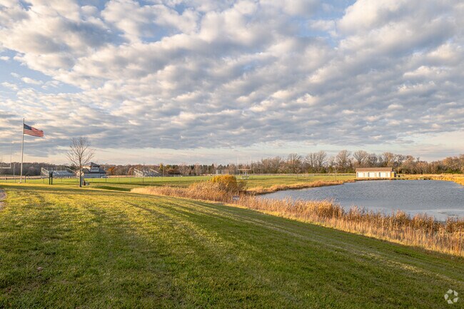 Friedenfeld Park features a football field and pond in the Germantown neighborhood.