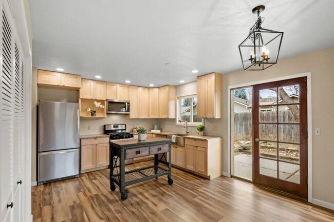 Kitchen with refridgerator - 3035 W Brenda Loop