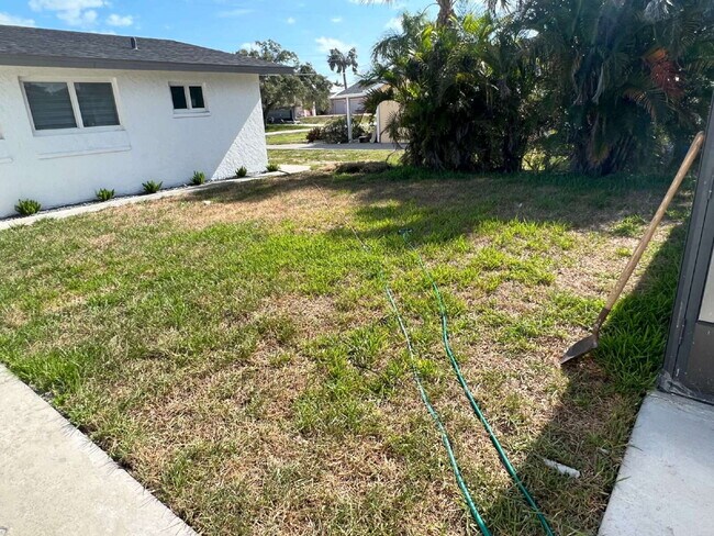 Building Photo - "Charming 2-Bed Retreat Waterfront W/Pool ...