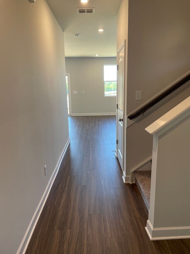 Building Photo - Introducing a stunning home