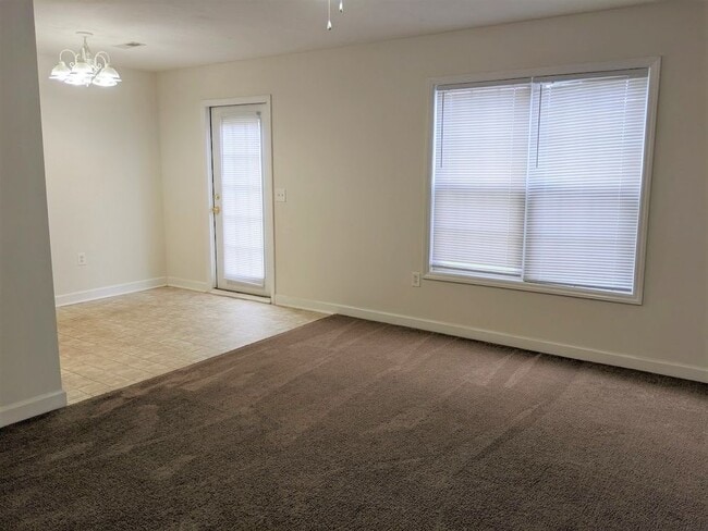 Building Photo - LARSON PLACE TOWN HOMES