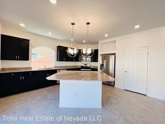 Building Photo - 4 br, 3.5 bath House - 7760 S Westwind Rd