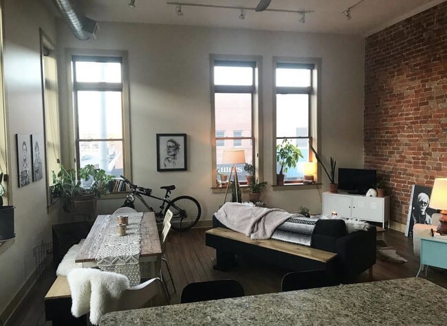 Tall ceilings and exposed brick - 136 N Hastings Ave