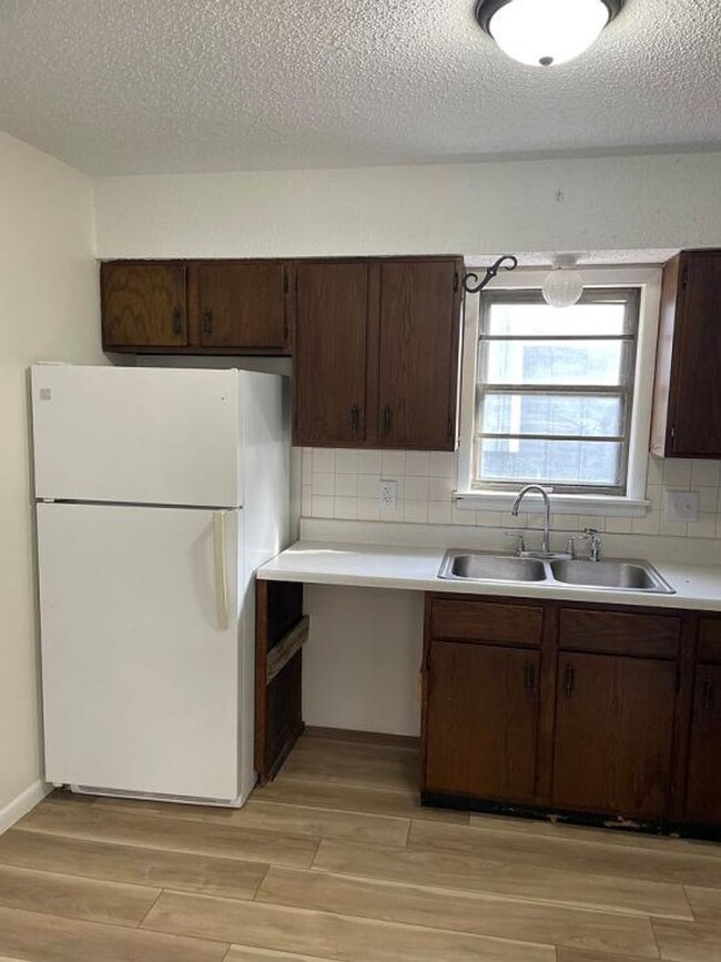 Building Photo - Quality Home Management