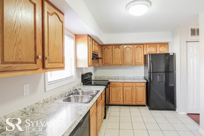 Building Photo - Fall in love with this beautiful brick tow...