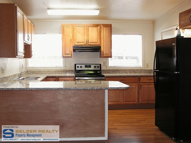 Building Photo - Surprisingly roomy 4 bd. house; convenient...