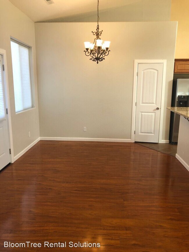 Building Photo - 3 br, 2 bath House - 7908 E Roundup Drive