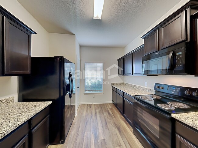 Building Photo - 12250 Commander Dr